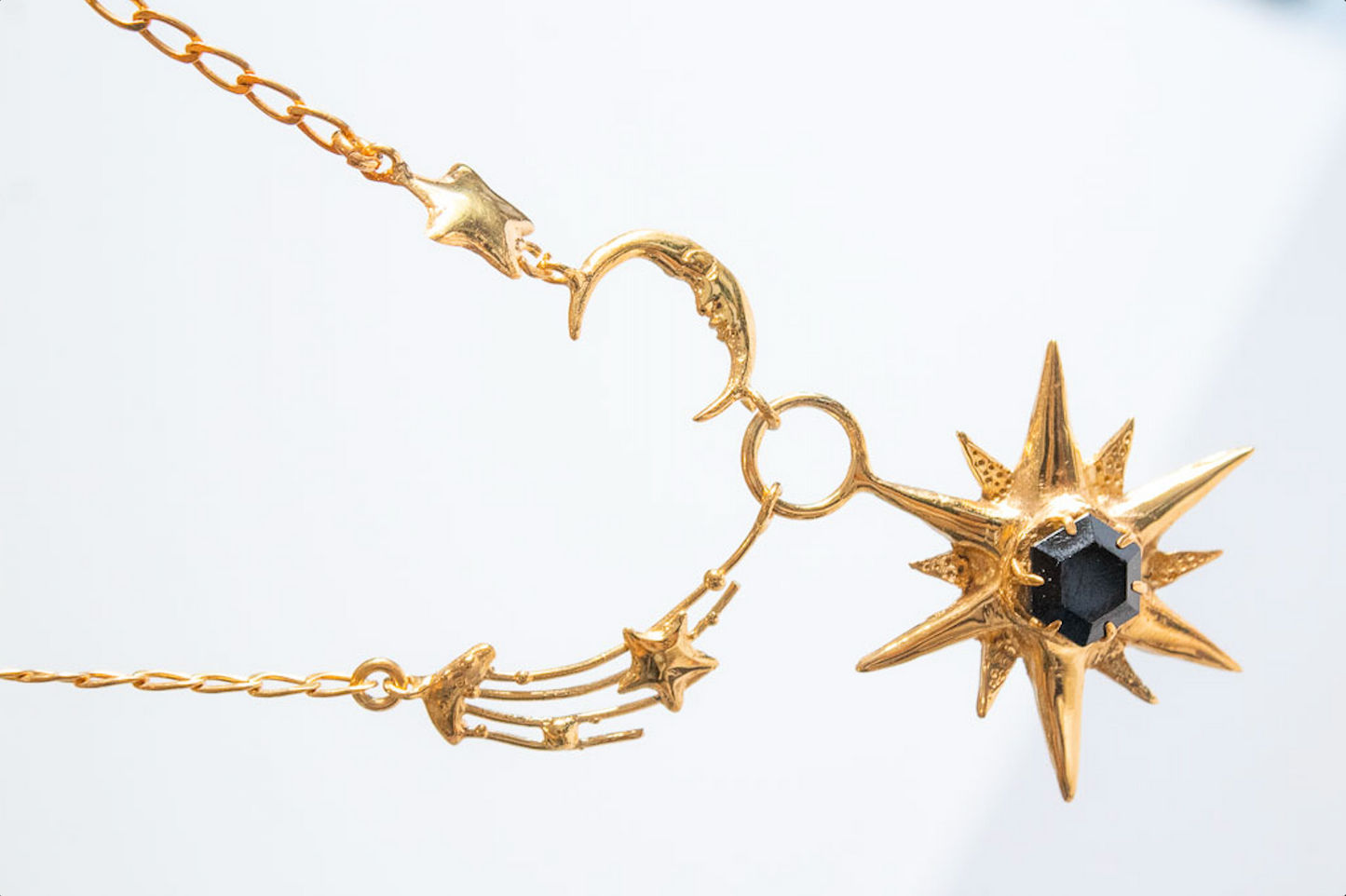Ecos. Collar con astros y ónix
