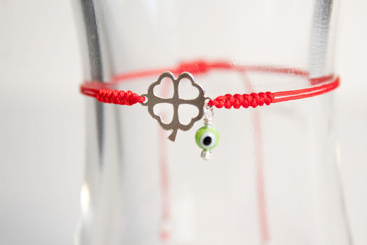 Talismán. Pulsera con dije de plata .925