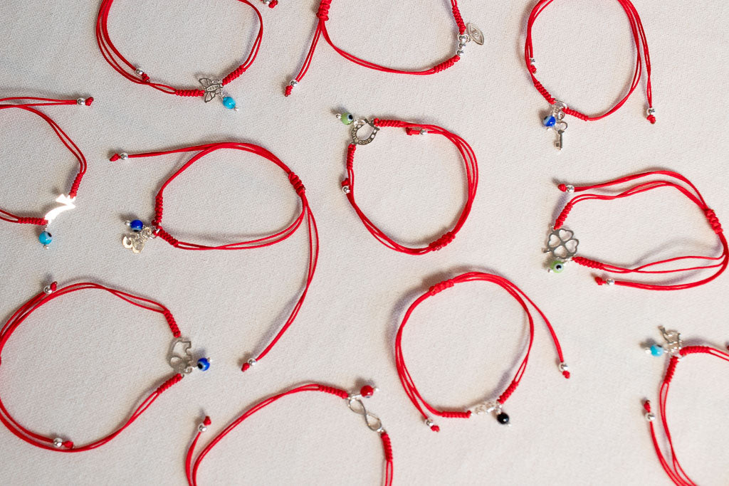 Talismán. Pulsera con dije de plata .925