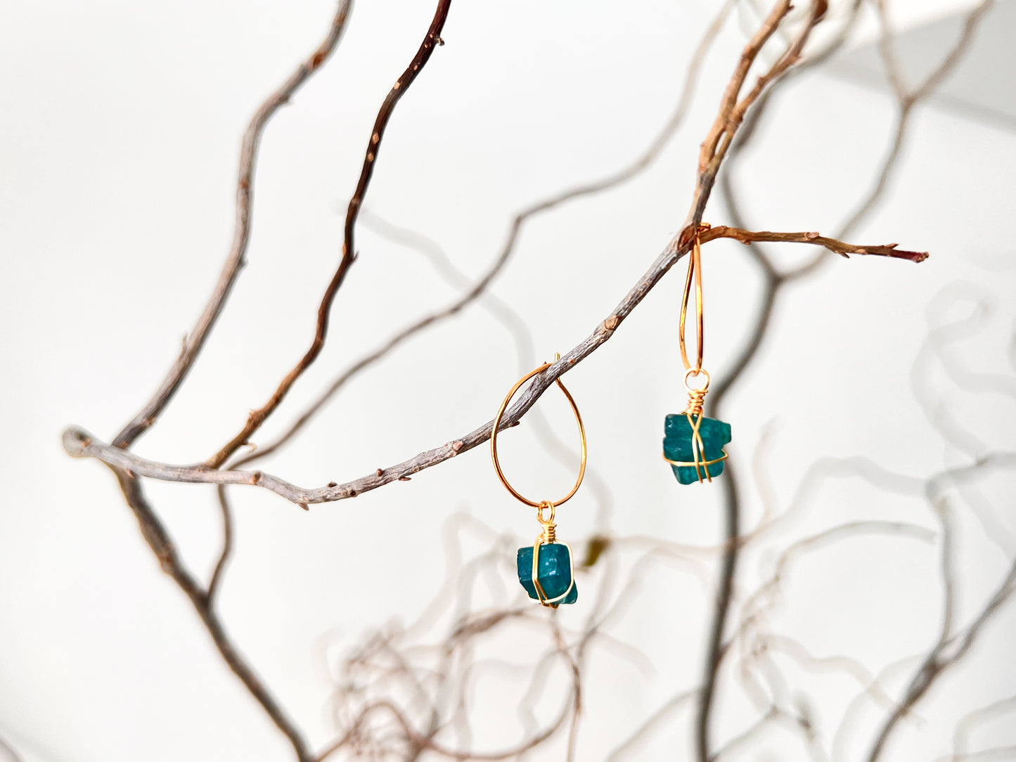 Useful. Minimalist hoop earrings with blue apatite