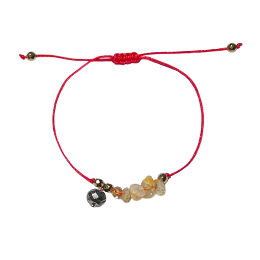 Abundancia Solar. Pulsera de hilo rojo con citrino y pirita