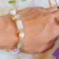 Tonantzin. Pulsera con aguamarina, cuarzo rosa, amatista, cuarzo citrino y perla de concha.