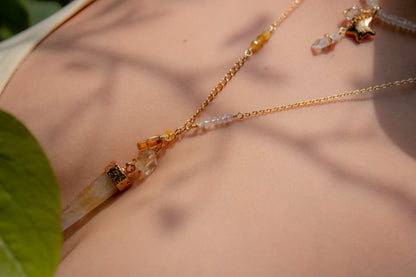 Horizonte Vivo. Collar con cuarzo mango, ojo de gato, cuarzo blanco, citrino y ámbar