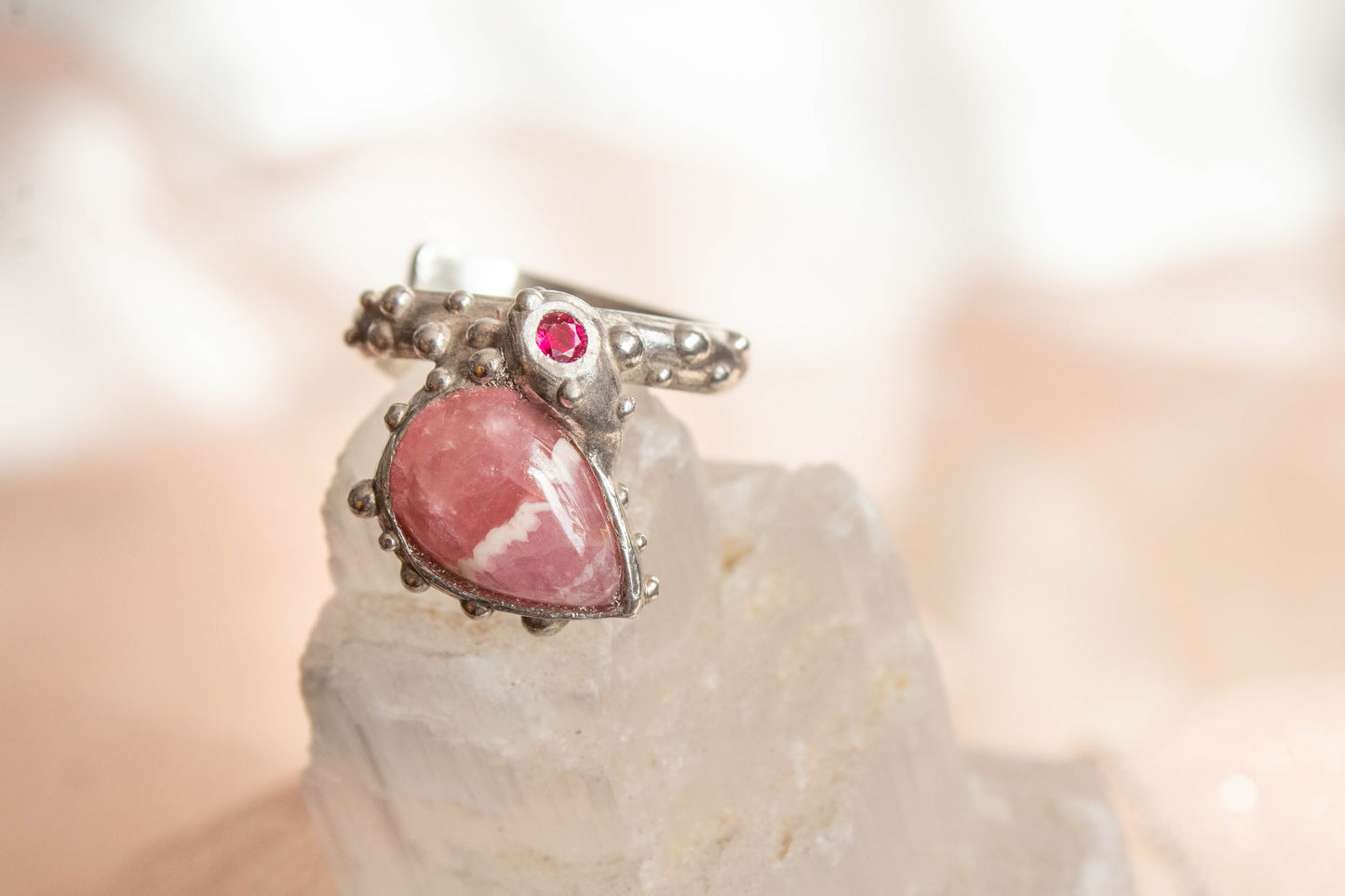Heart. Rhodochrosite ring with ruby 