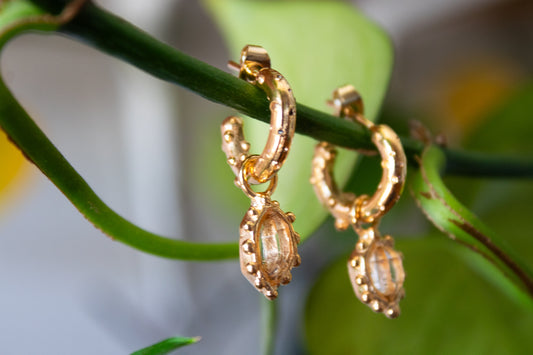 Claridad. Arracadas con herkimer