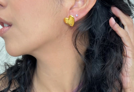 Xareni. Heart shaped earrings