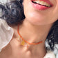 Encanto. Collar de cornalina con dije de la suerte, herkimer y topacio