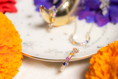 Arracadas de zafiro amarillo, azul y rosa en plata .925