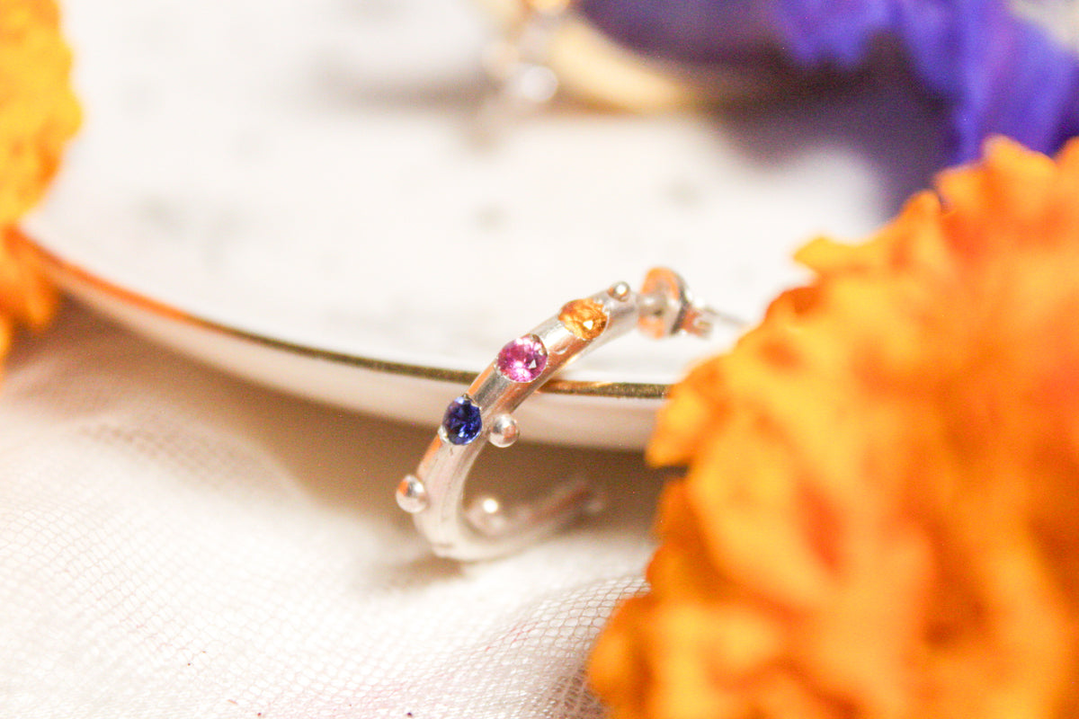 Arracadas de zafiro amarillo, azul y rosa en plata .925