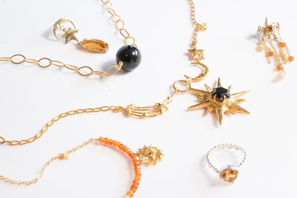 Ecos. Collar con astros y ónix