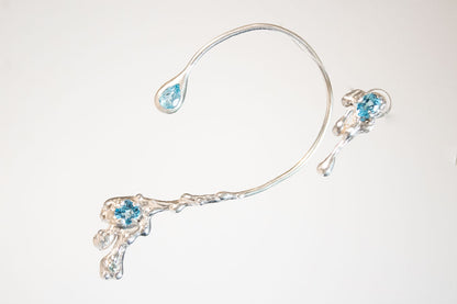 Ánima. Arete y ear climber con topacio azul