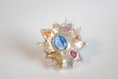 Estelar. Anillo de estrella con luna, cianita, rubí y citrino