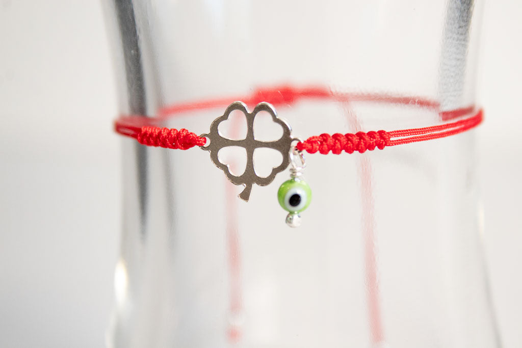 Talismán. Pulsera con dije de plata .925