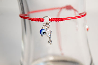 Talismán. Pulsera con dije de plata .925