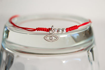 Talismán. Pulsera con dije de plata .925