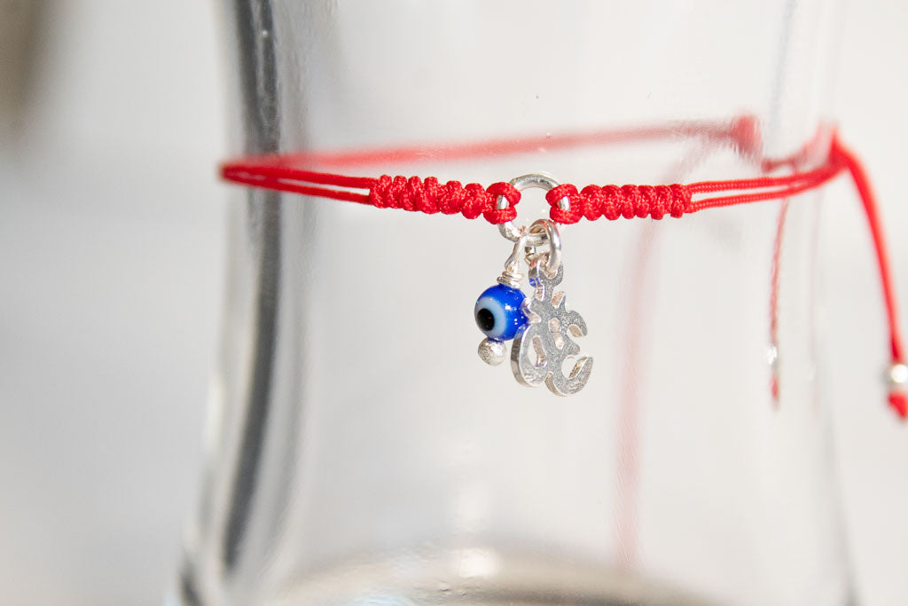 Talismán. Pulsera con dije de plata .925