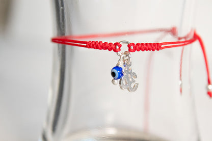 Talismán. Pulsera con dije de plata .925