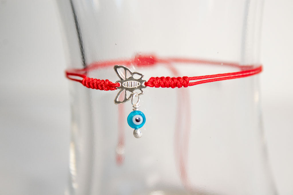 Talismán. Pulsera con dije de plata .925