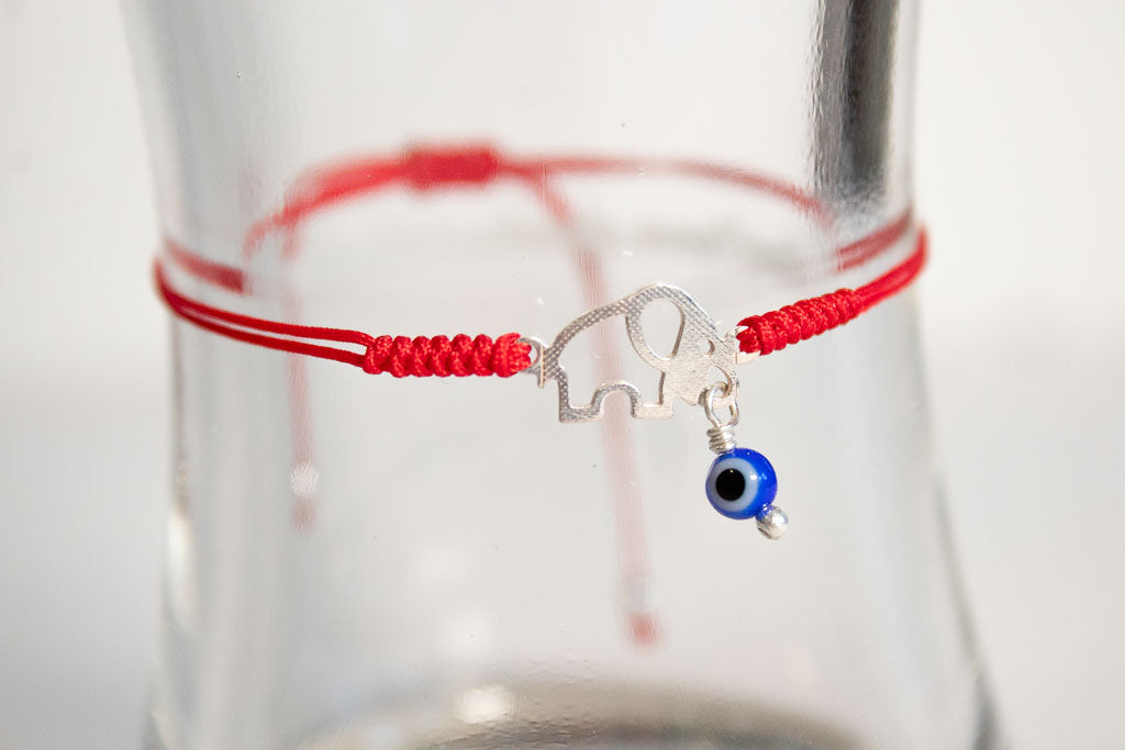 Talismán. Pulsera con dije de plata .925