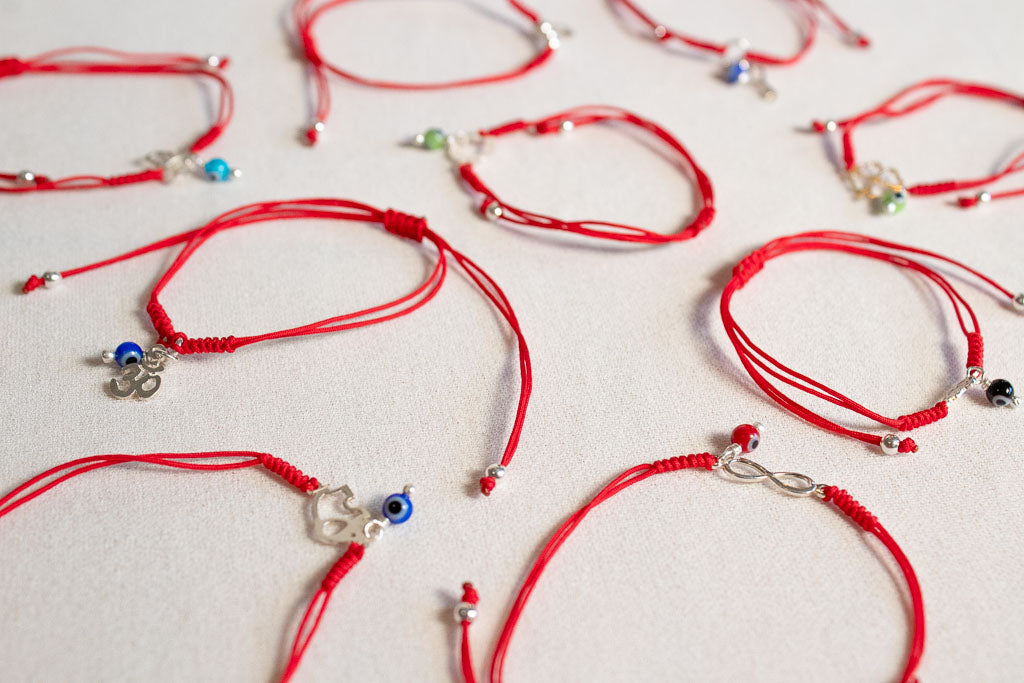 Talismán. Pulsera con dije de plata .925