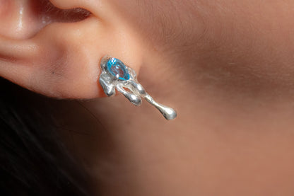 Ánima. Arete y ear climber con topacio azul