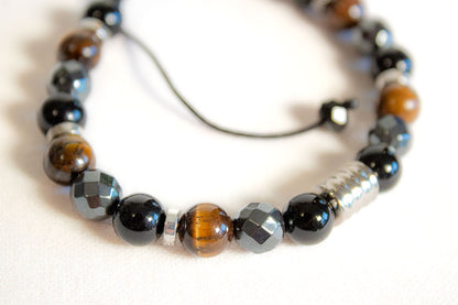 Fuerza y Protección. Pulsera con turmalina negra, hematita y ojo de tigre.