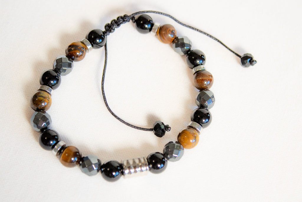 Fuerza y Protección. Pulsera con turmalina negra, hematita y ojo de tigre.