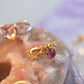 Cascada. Ear cuff con cabujón de piedra preciosa. Peridoto, granate, rodolita, topacio o amatista.