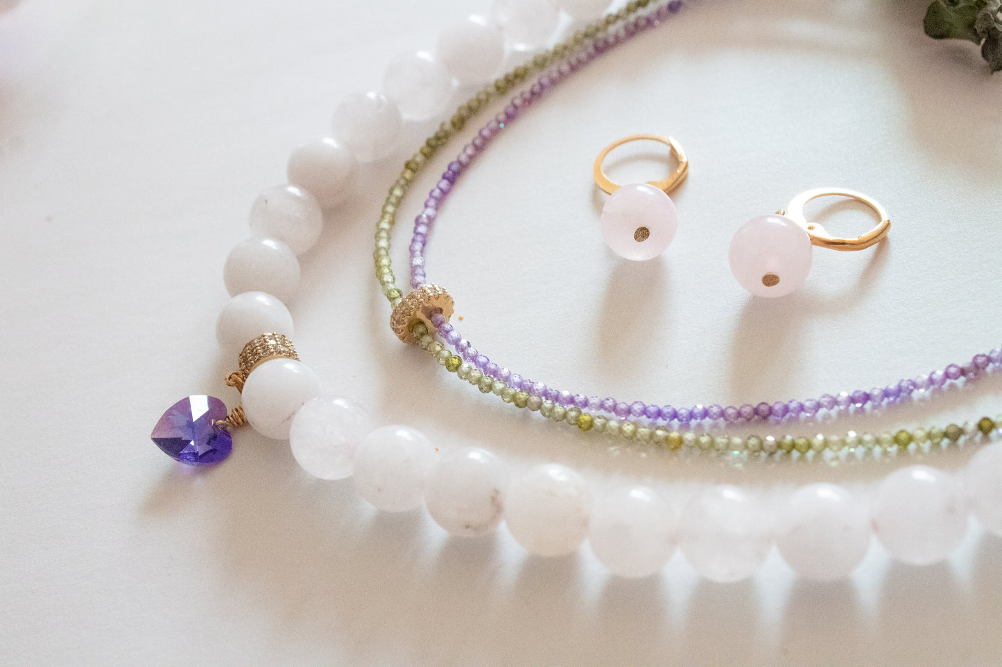 Bloom. Necklace with zircons and rose quartz.