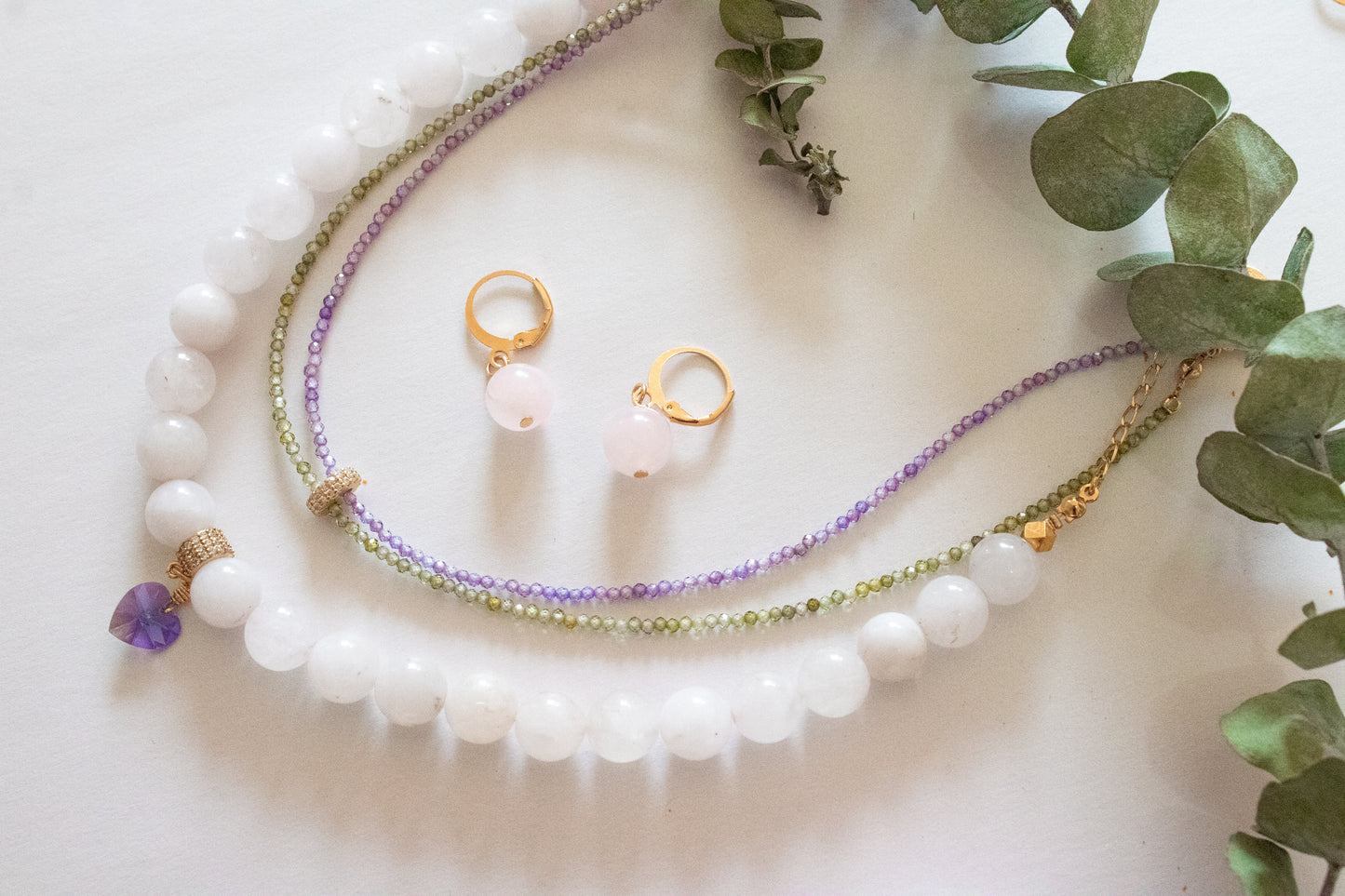 Bloom. Necklace with zircons and rose quartz.
