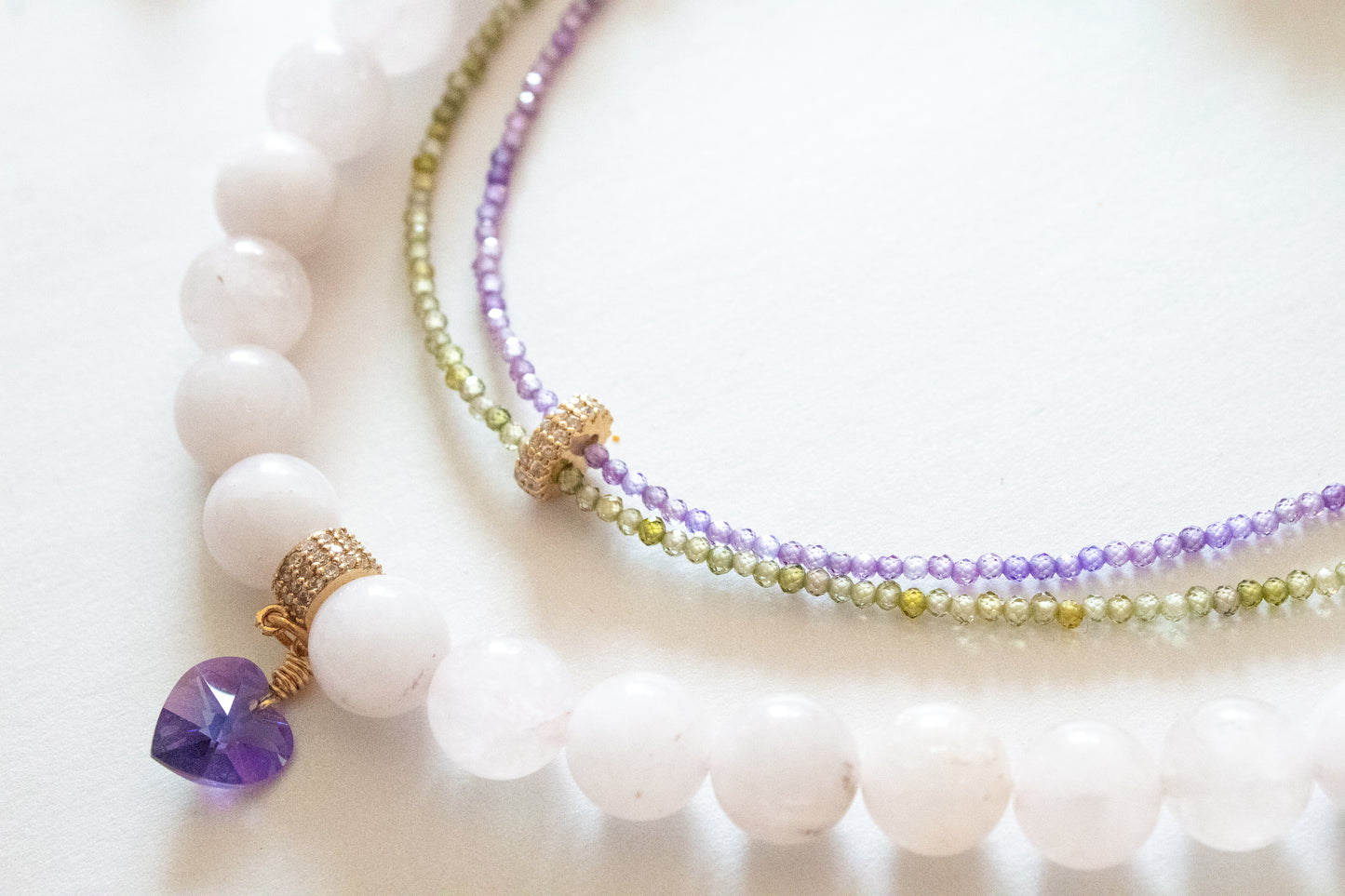 Bloom. Necklace with zircons and rose quartz.