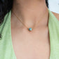 Celeste. Collar con estrella de esmeralda