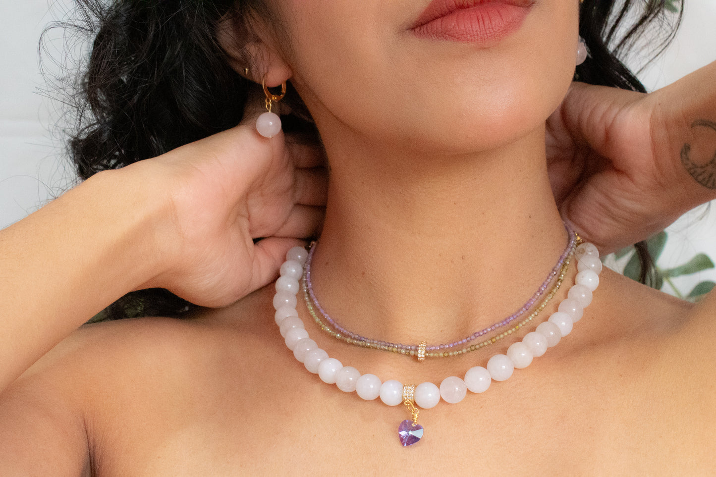 Bloom. Necklace with zircons and rose quartz.