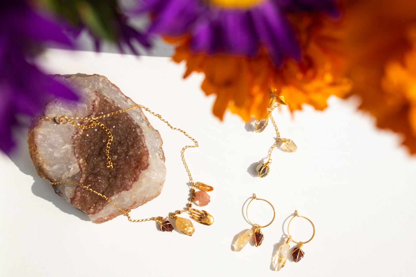 Apotropaic. Earrings with garnet and citrine