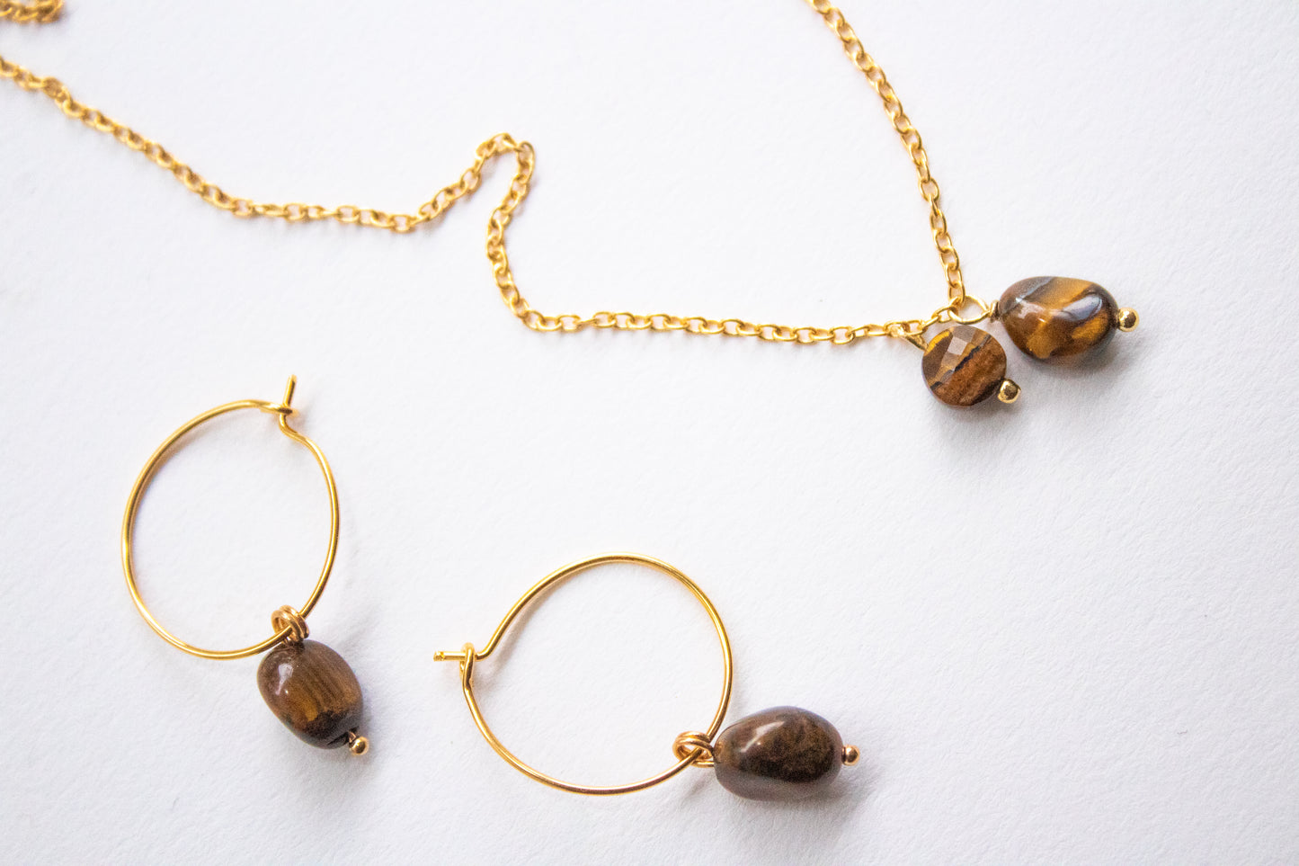 Ich. Minimalist hoop earrings with tiger eye