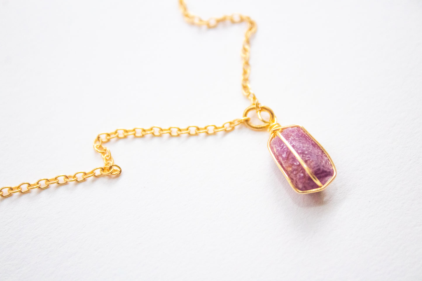 Yaaj. Minimalist necklace with rustic ruby.