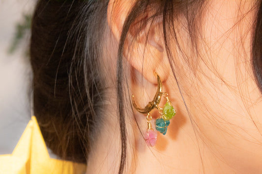 Cheel. Moon hoop earrings with peridot, apatite and pink tourmaliine