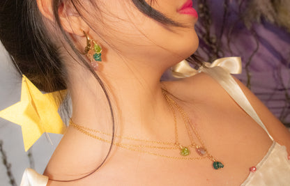 Chéel. Medias arracadas de luna con peridoto, apatito y turmaliina rosa