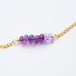 Yatzil. Pulsera con amatista y mariposa swarovski