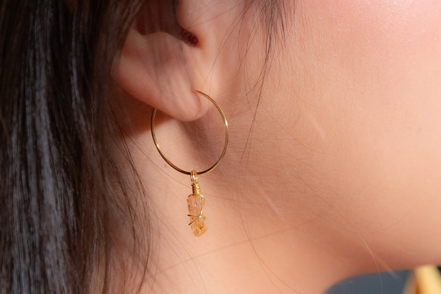 Yaluk. Minimalist hoop earrings with yellow topaz