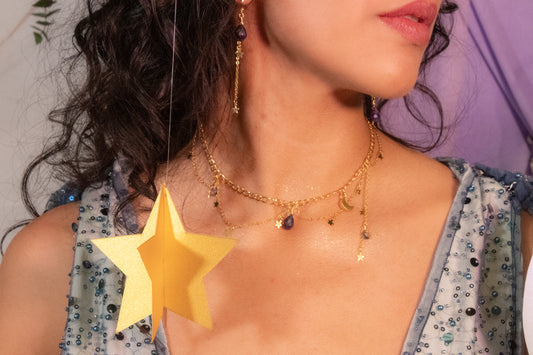 Talitha. Aretes largos con gotas de zafiro y cadena de estrellas