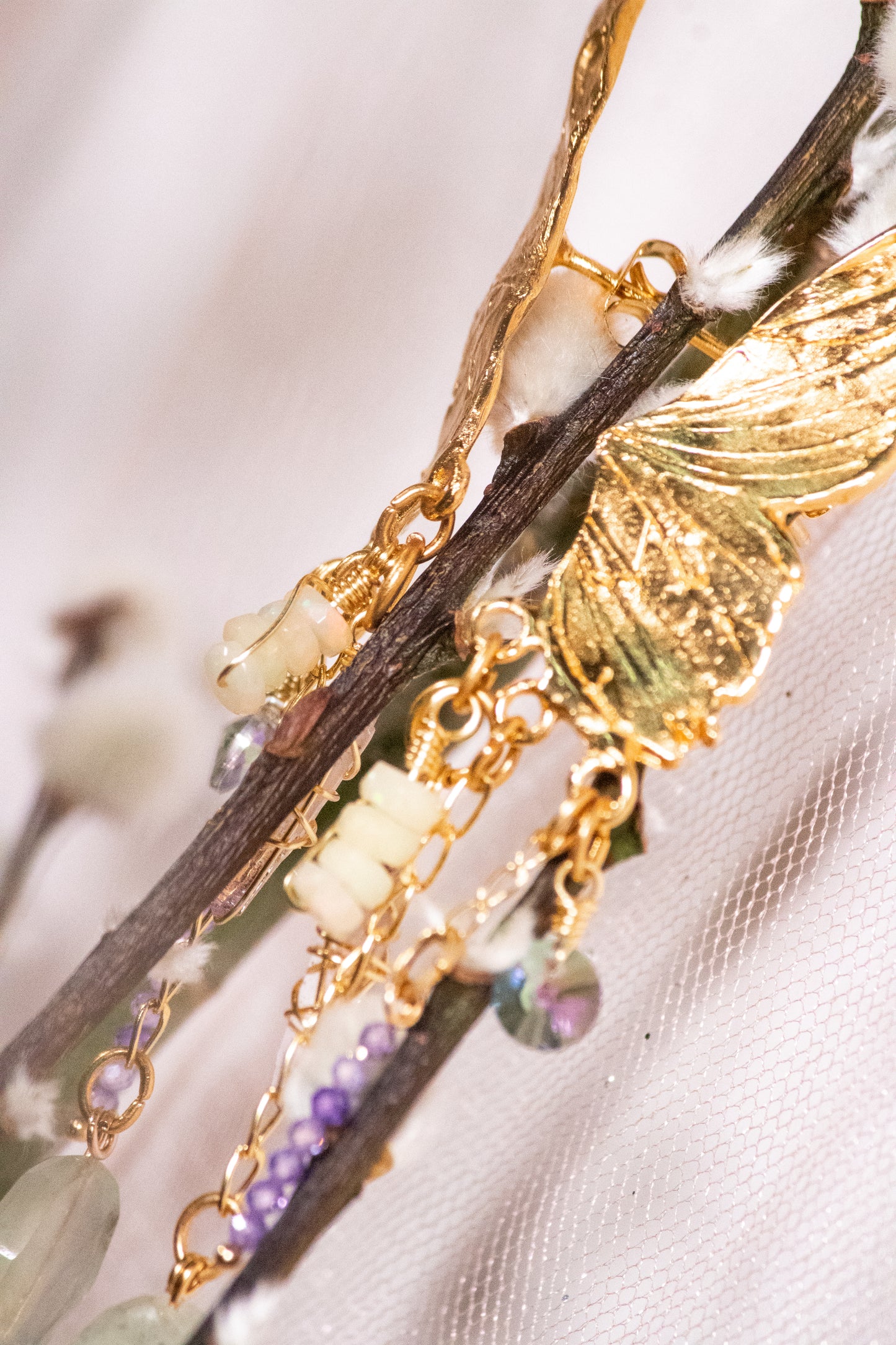 Amaité. Earrings with prehnite, zircons, amethyst, opal and Swarovski crystal