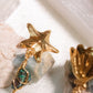 Axochitl. Aretes con turquesa, calcopirita y cuarzo blanco