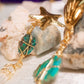 Axochitl. Aretes con turquesa, calcopirita y cuarzo blanco
