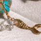 Axochitl. Collar con turquesa y estrella swarovski