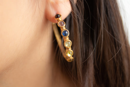 Carites. Hoop earrings with gems