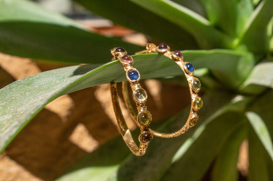 Carites. Hoop earrings with gems