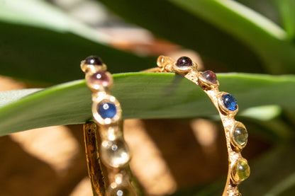 Cárites. Arracadas con gemas