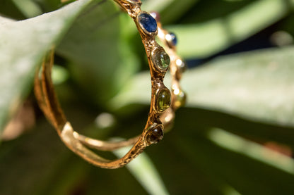 Cárites. Arracadas con gemas